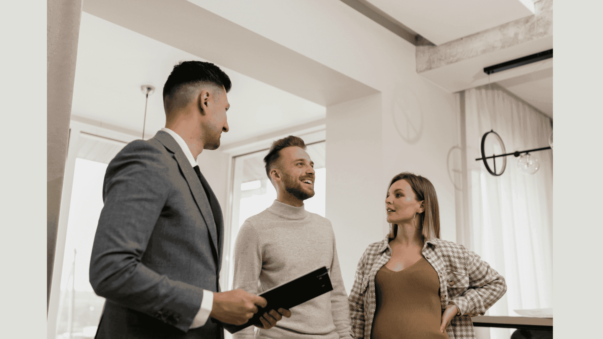 Real estate agents discussing rental property marketing strategies in Squamish, showcasing platforms, listings, and exposure methods.