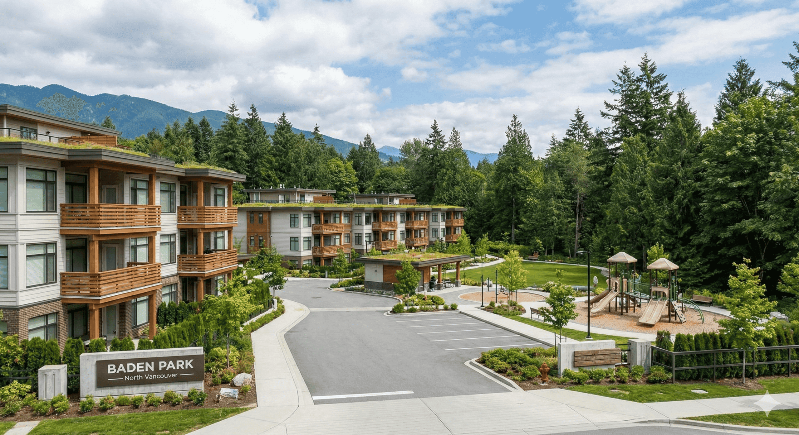 Modern apartment complex at Baden Park with lush greenery and mountain views, ideal for rental opportunities on the North Shore.