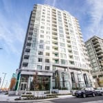 Contemporary high-rise residential building in Toronto, modern apartment complex near downtown with luxury amenities and prime location.