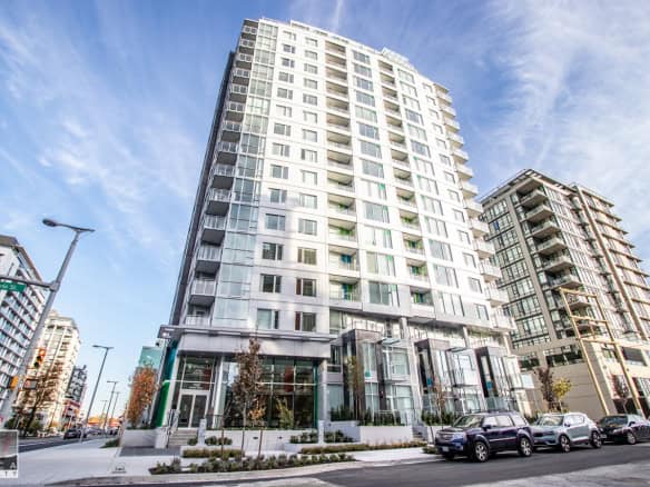 Contemporary high-rise residential building in Toronto, modern apartment complex near downtown with luxury amenities and prime location.