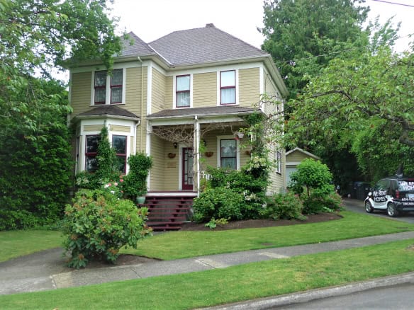 Charming historic house with lush garden and vibrant landscaping, available for rent through Orca Realty Inc. in Vancouver, BC. Perfect for families seeking a beautiful leased home in a tranquil neighbourhood.