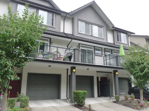 Contemporary townhouse with modern design, spacious balconies, and landscaped gardens in a family-friendly neighbourhood. Ideal for those seeking stylish urban living and real estate investment opportunities near Vancouver.