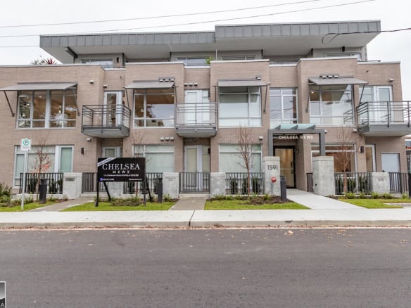 Contemporary multi-unit residential building in Vancouver, BC, showcasing modern architecture and sleek design elements, offered by Orca Realty Inc.