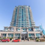 Modern high-rise condo building in Vancouver, BC, featuring spacious balconies and contemporary architecture, perfect for luxury living and real estate investment.
