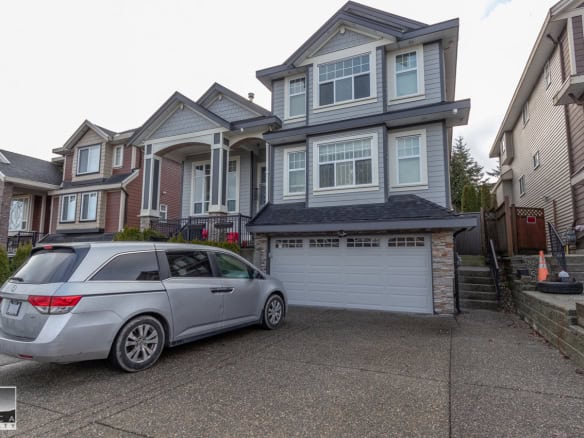 Modern multi-story family home in a desirable neighbourhood featuring a spacious garage and well-maintained driveway. Perfect for those seeking Vancouver Island real estate.