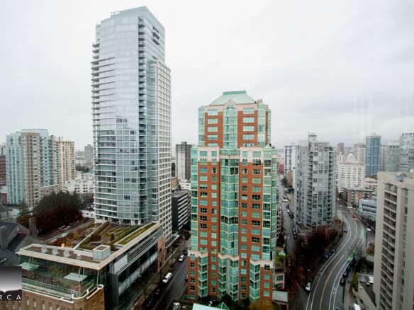 Modern high-rise buildings in downtown Vancouver, showcasing urban real estate development and skyline views, ideal for real estate investment and property buyers.