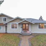 Charming Vancouver home for sale by Orca Realty Inc., featuring classic architecture, landscaped yard, and spacious interior, ideal for families seeking Vancouver real estate opportunities.