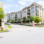 Luxurious modern condo building in Vancouver with large windows and balconies, surrounded by greenery, exemplifying premium real estate by Orca Realty Inc.