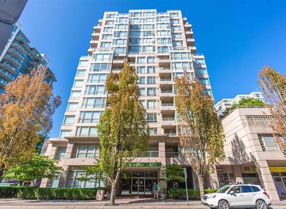 Modern high-rise residential building in downtown Vancouver, BC, featuring spacious apartments, contemporary architecture, and urban living amenities.