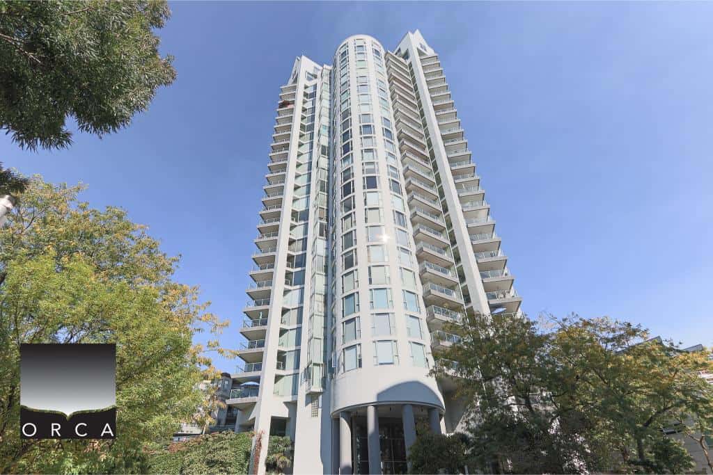 Modern high-rise condo building in Vancouver, BC, showcasing luxury apartments with panoramic city views by Orca Realty Inc.