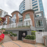 Luxury downtown Vancouver condo building with modern architecture and scenic city views, MLS listings, and investment opportunities. Orca Realty Inc. offers expert real estate services.