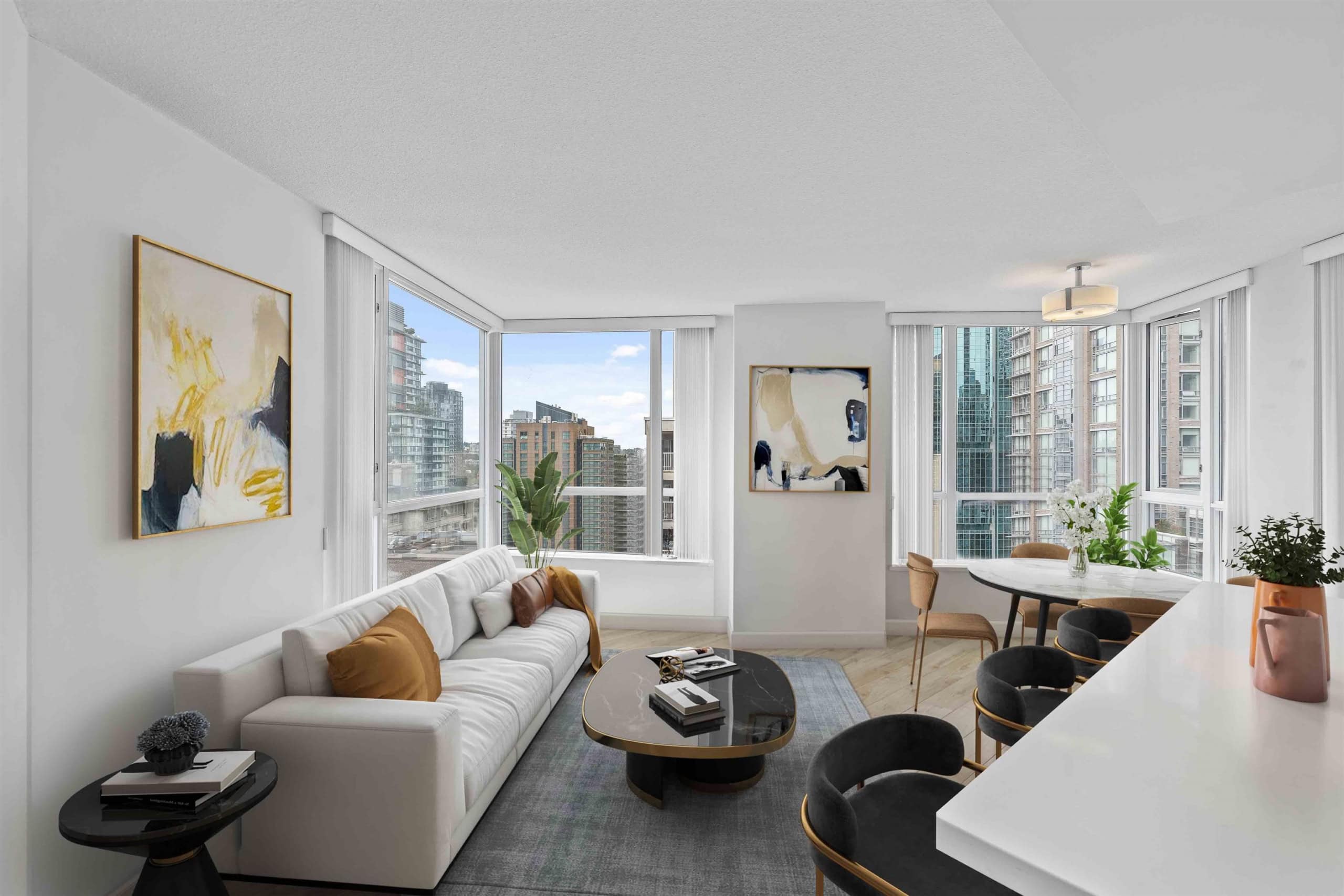 05 Modern city skyline views from a stylish, bright high-rise apartment living room in downtown Vancouver, featuring contemporary decor, large windows, and open-concept design for luxury condo living.