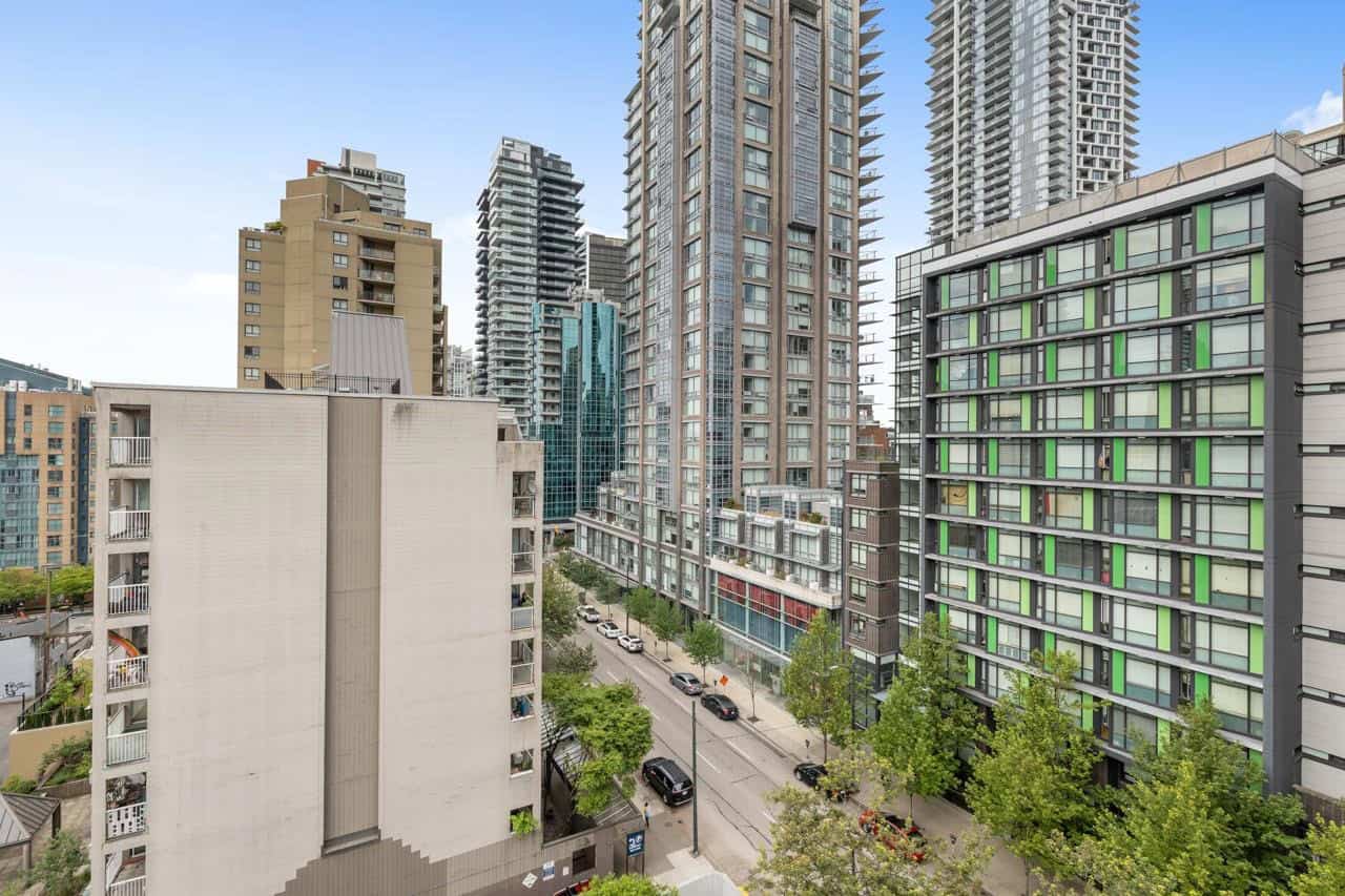 08 Modern high-rise residential buildings in downtown Vancouver, BC, showcasing contemporary architecture and urban living spaces, ideal for real estate investment or living in Vancouver.
