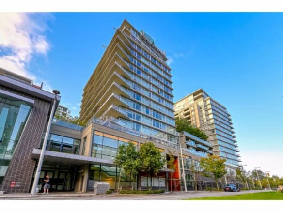 Modern high-rise condominium building in Vancouver showcasing luxurious urban living options.