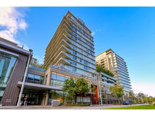 Modern high-rise condominium building in Vancouver showcasing luxurious urban living options.