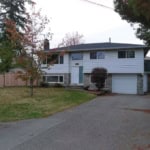 Charming two-storey residential home with attached garage, well-maintained yard, and mature trees located in a peaceful neighbourhood in Ontario. Perfect for families seeking a cozy suburban lifestyle.