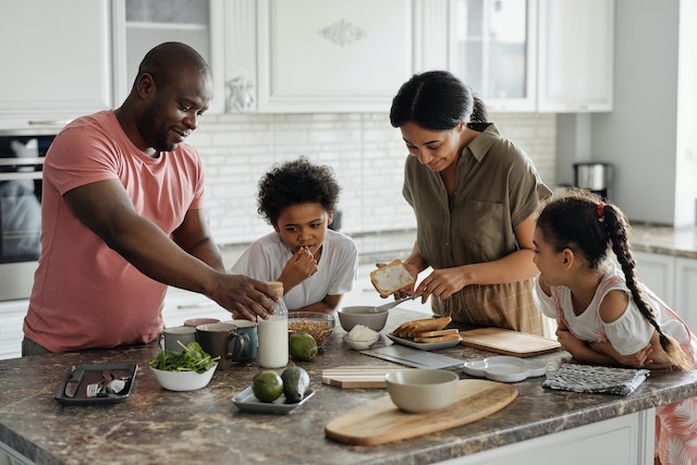 smiling family in kitchen