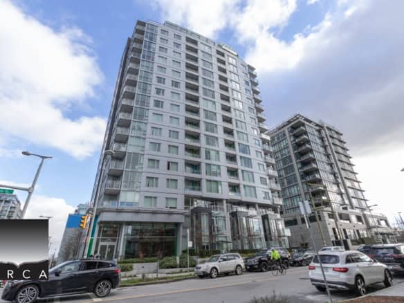 Modern high-rise condo building in downtown Vancouver, showcasing luxury residential units, contemporary architecture, and prime urban living location for real estate investment.