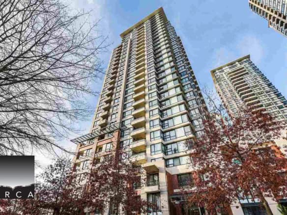 Luxurious high-rise condominium in Vancouver with modern architecture, spacious balconies, and panoramic city views, ideal for real estate investment and property buyers.
