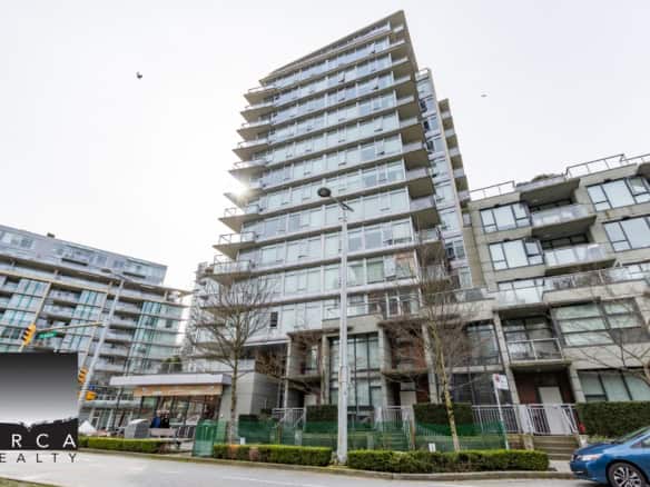 Modern waterfront condominium building in Vancouver, BC, showcasing contemporary architecture and large glass balconies, perfect for urban living.