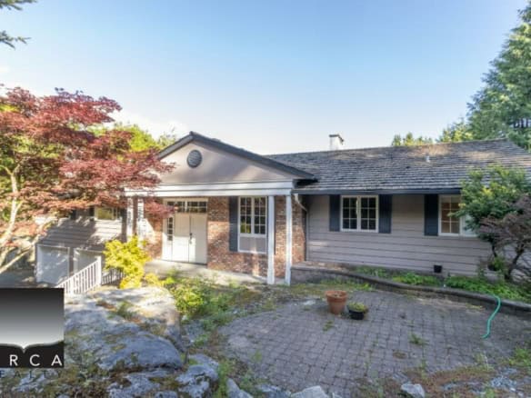 Charming residential property listed with Orca Realty Inc. featuring a cozy exterior, landscaped garden, and classic architecture, ideal for homebuyers seeking a serene neighbourhood in en_CA.