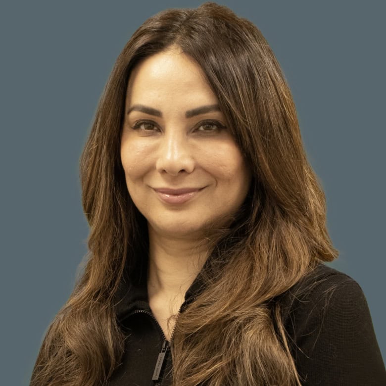 Professional women’s portrait for Orca Realty Inc., real estate agent, showcasing friendly and trustworthy service in the Vancouver real estate market.