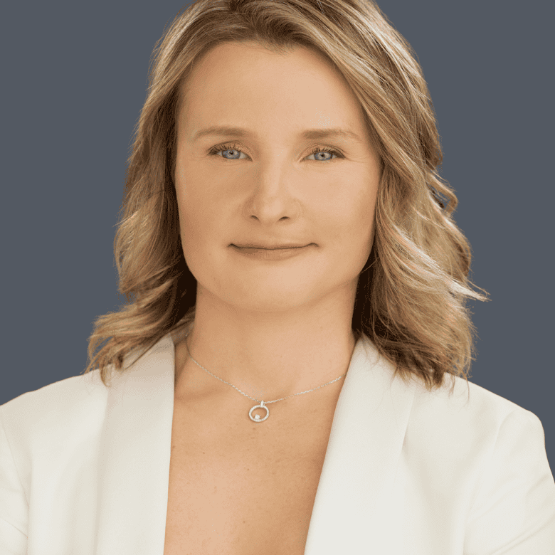 Warm professional woman portrait for Orca Realty Inc. showcasing expert real estate agent services, confidence, and approachable customer care in Vancouver, BC.