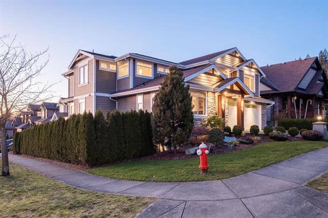 Orca Realty Inc. residential real estate property showcasing a modern house with landscaped yard and neighborhood charm in Victoria BC.