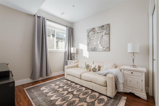 Bright and inviting living room with modern decor, neutral tones, and plenty of natural light, perfect for showcasing Vancouver real estate and homes for sale.