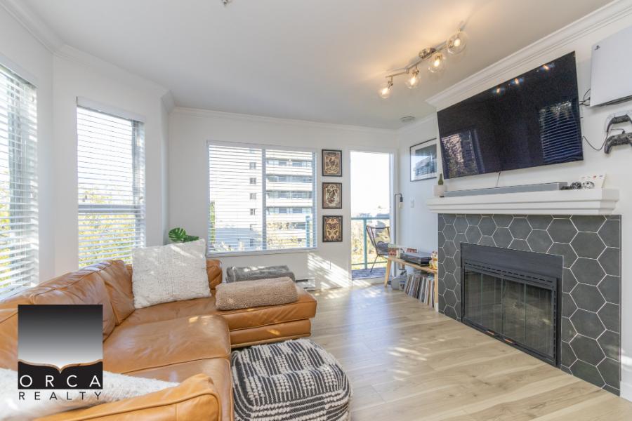 Modern living room with large windows, natural light, and stylish decor, ideal for Vancouver real estate buyers seeking urban comfort and contemporary design.