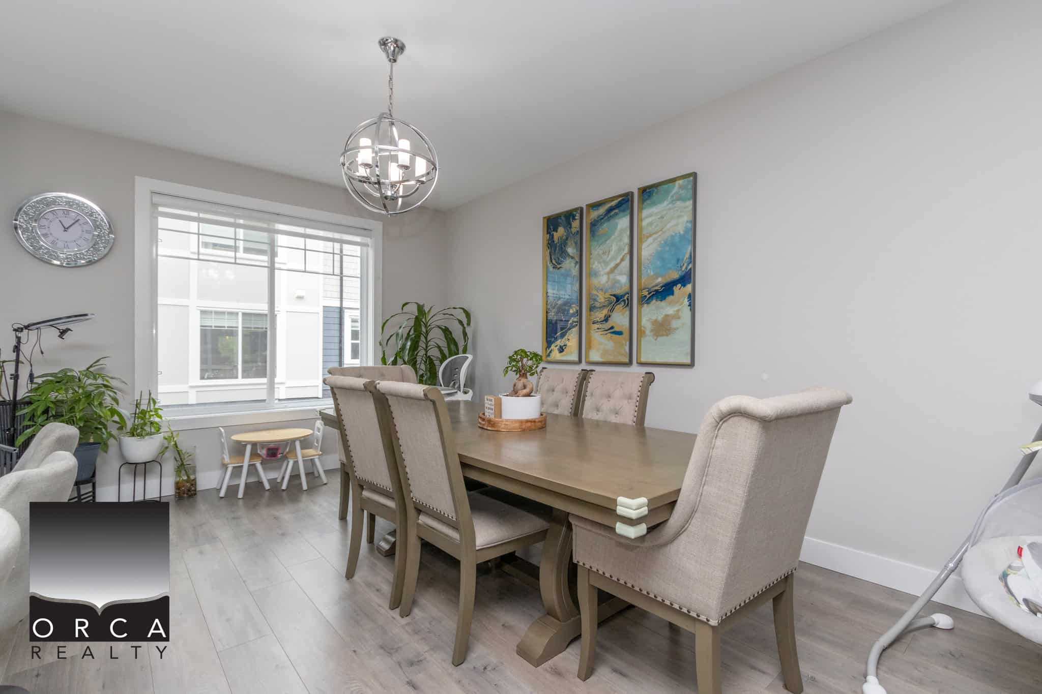 7 Bright interior dining room with modern decor, large window, and elegant furniture, ideal for Vancouver homebuyers seeking stylish real estate listings.