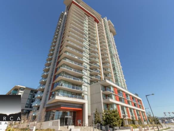 Contemporary high-rise residential building with spacious balconies, modern architecture, and Prime location in Vancouver, BC, offering luxury condos and apartments for sale and rent.
