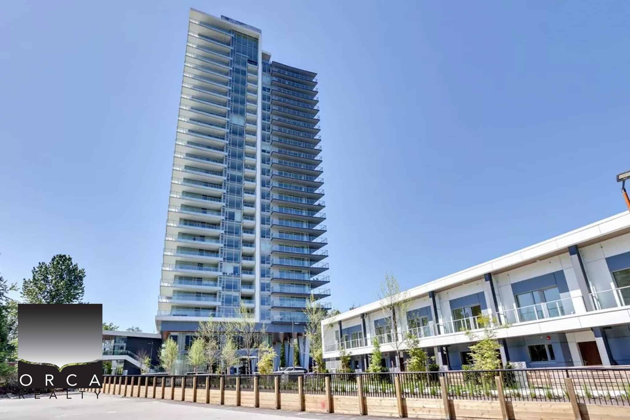 Contemporary high-rise condominium building showcasing modern architecture and luxurious amenities in Vancouver, BC, ideal for real estate investors and property buyers.