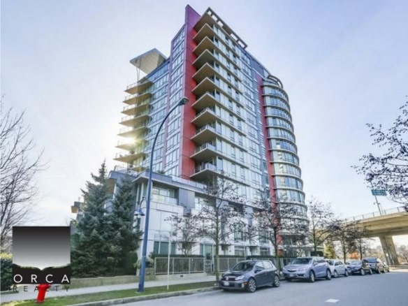 Contemporary high-rise residential building with glass balconies and modern architecture in Vancouver, BC.