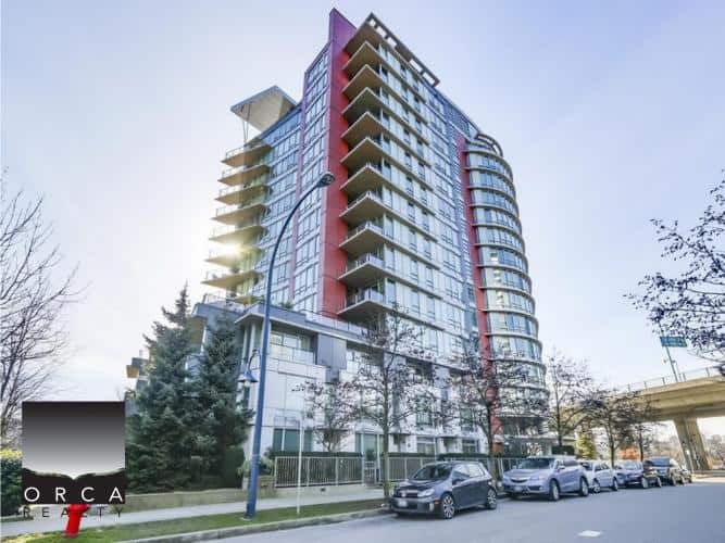 Contemporary high-rise residential building with glass balconies and modern architecture in Vancouver, BC.