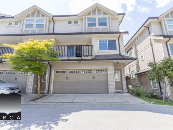 Spacious multi-level townhouse with attached garage and modern design, located in a desirable community in Canada, perfect for families and professionals seeking a comfortable home.