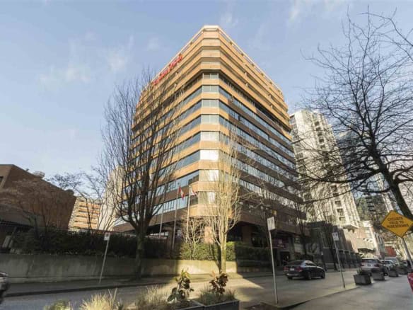 Modern office building in downtown Vancouver, BC, showcasing commercial real estate leasing and sales opportunities with Orca Realty Inc.