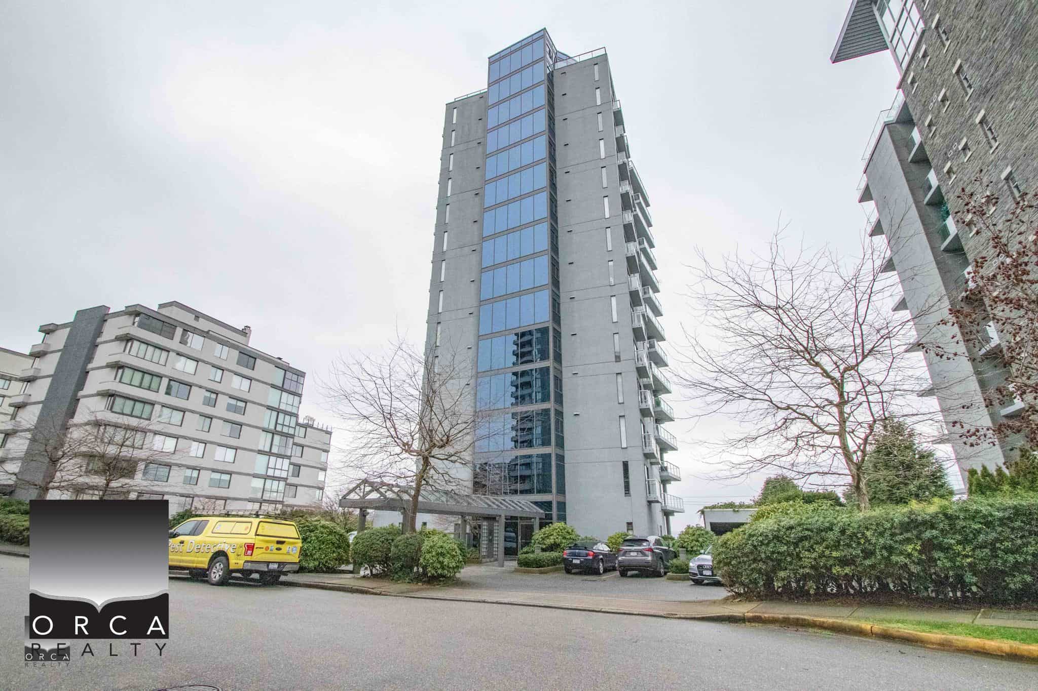 Contemporary high-rise condo building in Vancouver, showcasing modern architecture and city skyline views, perfect for real estate investment and luxury living in British Columbia.