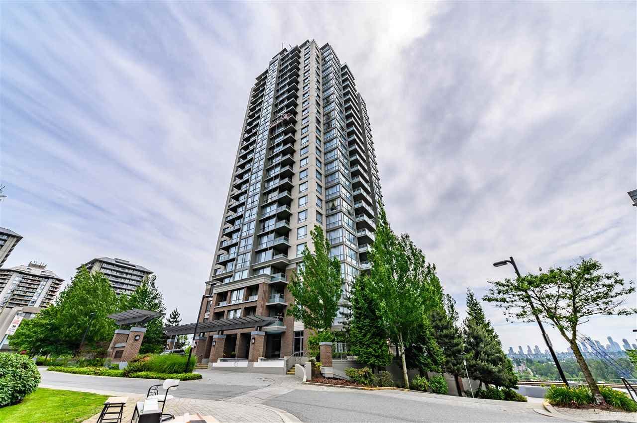 Luxury high-rise condo in Vancouver with modern architecture and stunning city views, available through Orca Realty Inc.