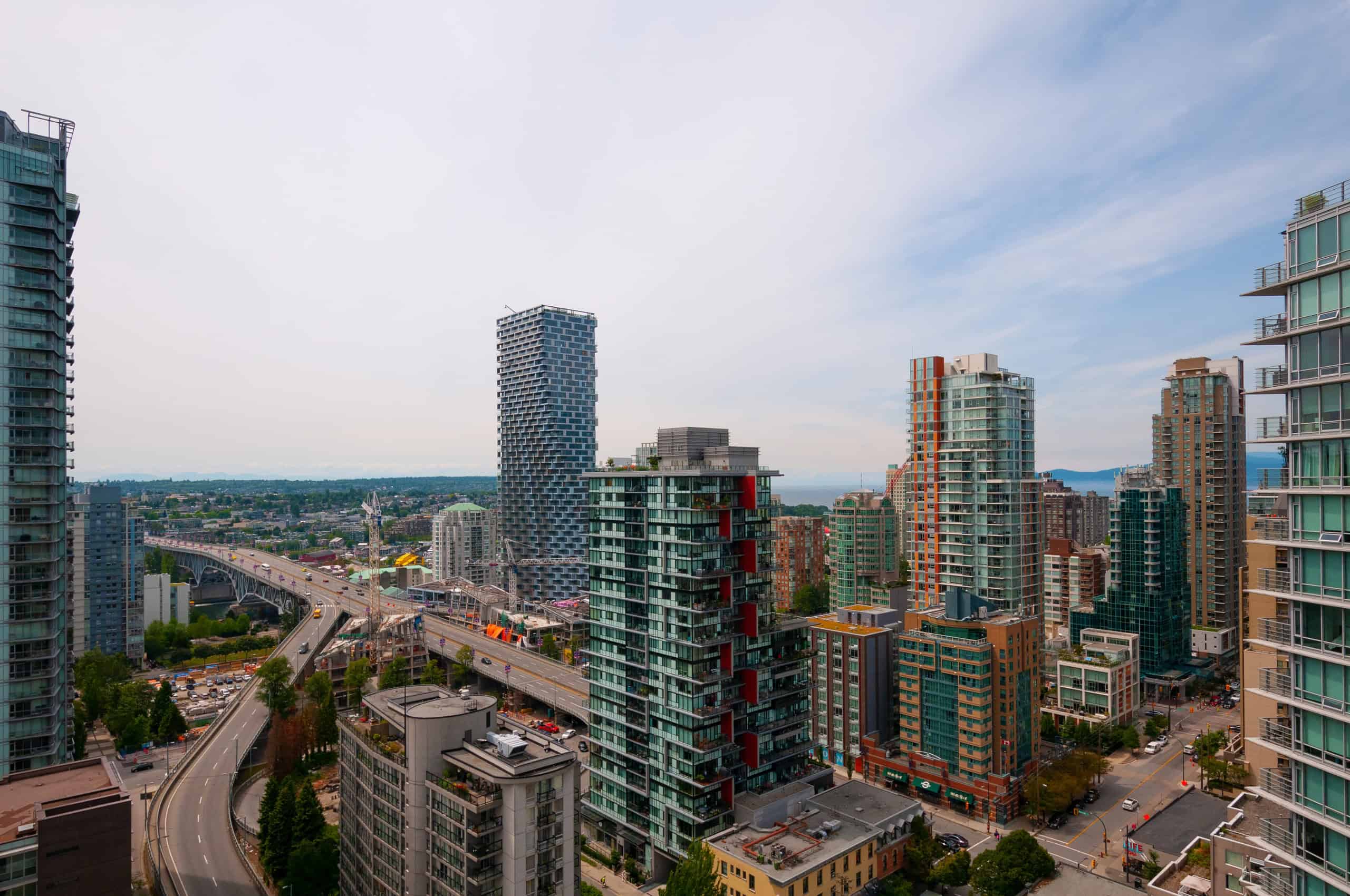 025 Modern Vancouver high-rise buildings with cityscape view, showcasing condo and apartment options in downtown Vancouver. Perfect for real estate investment and residential living in BC.