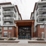 Modern multi-family residential building in Vancouver with contemporary architecture and spacious balconies, perfect for urban living and real estate investments.