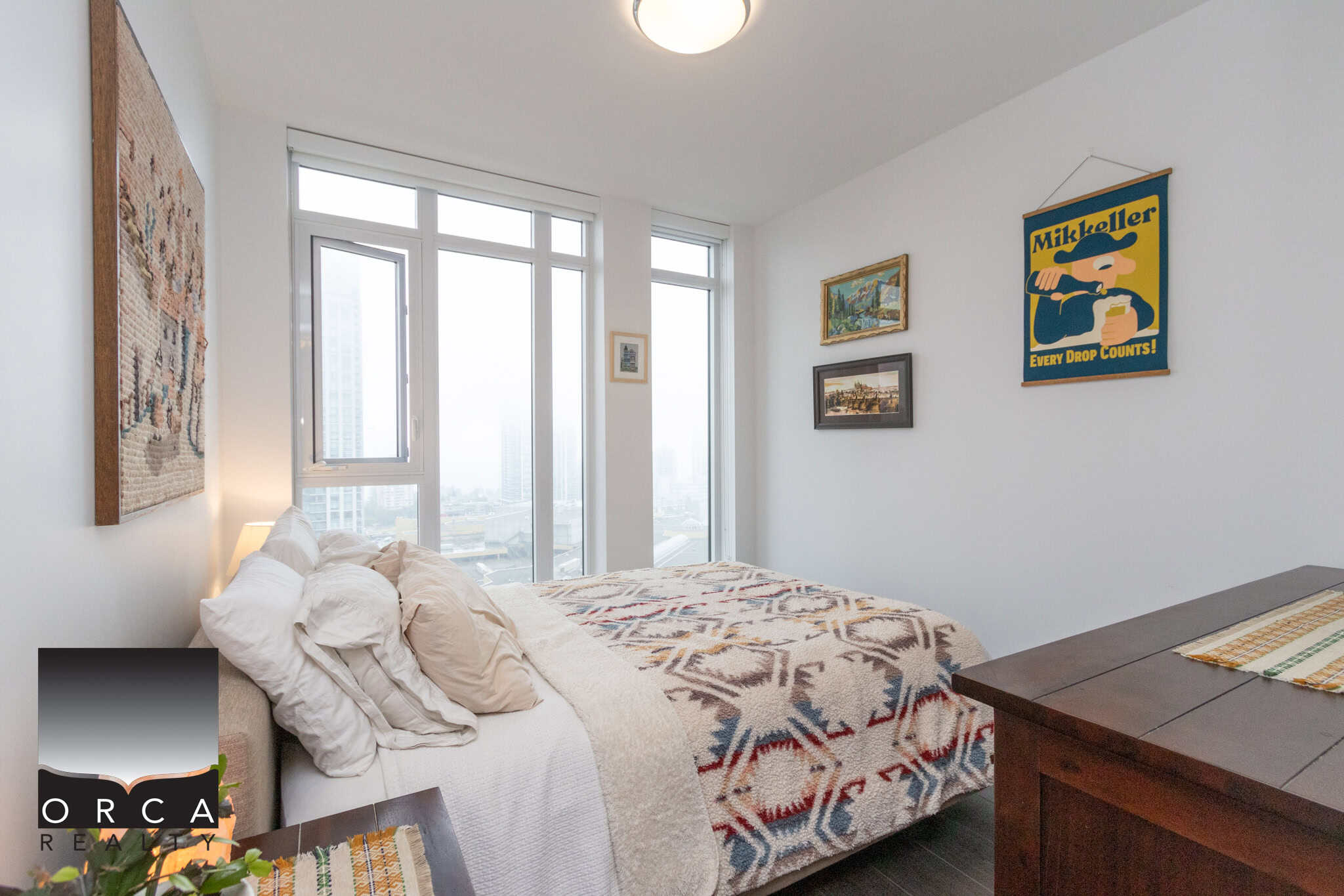 Modern downtown Vancouver condo with stunning city views and natural light, perfect for homeowners and real estate investors seeking Vancouver property listings.