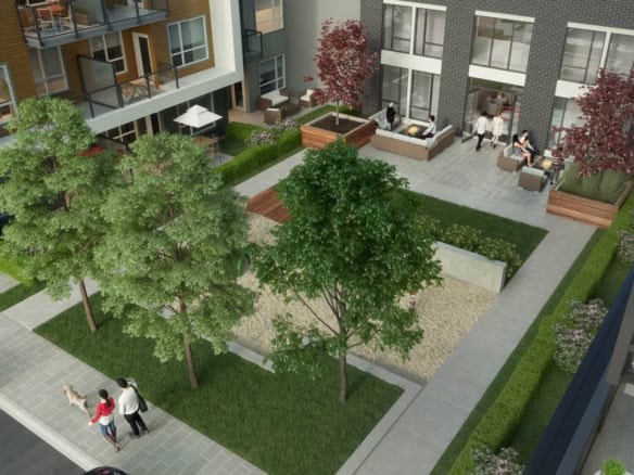 Modern urban courtyard with lush greenery and outdoor seating at Orca Realty Inc.