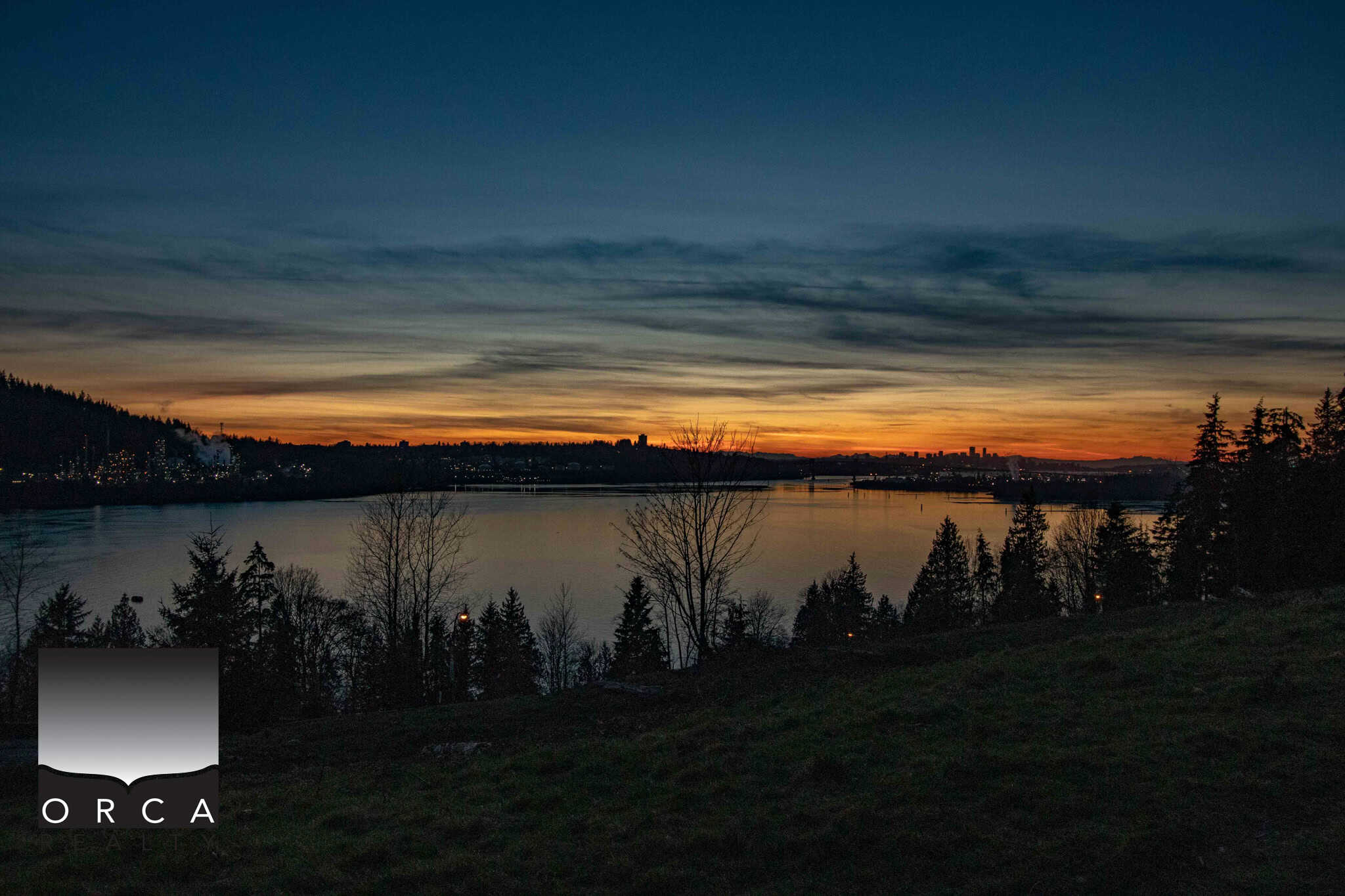 Stunning sunset over the river with a scenic view, ideal for real estate listings and showcasing natural beauty.