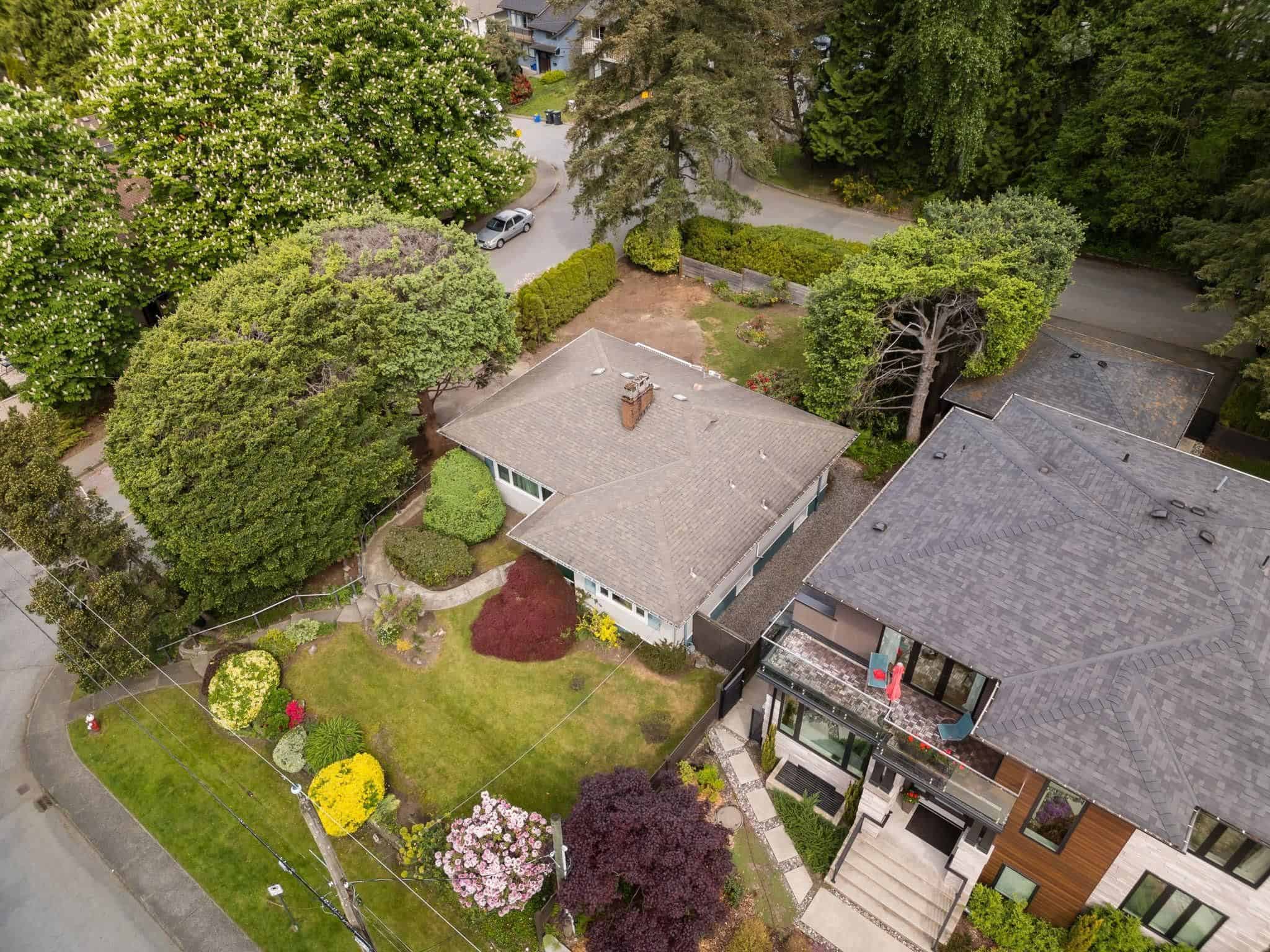Spacious Vancouver home with lush greenery, private yard, and modern architecture. Ideal for families seeking a cozy neighborhood with excellent real estate options in BC.