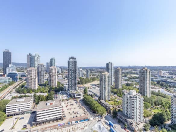 Luxury downtown Vancouver skyline featuring high-rise condos and modern residential buildings with scenic city views, ideal for real estate investment and property listing in Vancouver.