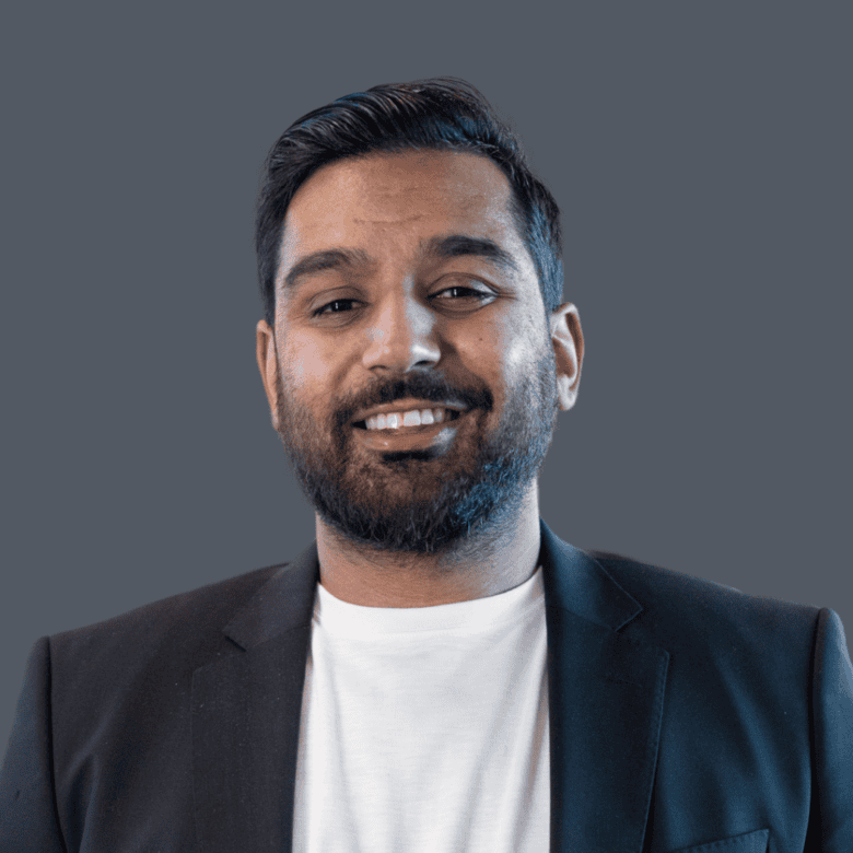 Modern real estate agent portrait showcasing professional attire, representing Orca Realty Inc. in the Vancouver area. Perfect for establishing trust in real estate services.