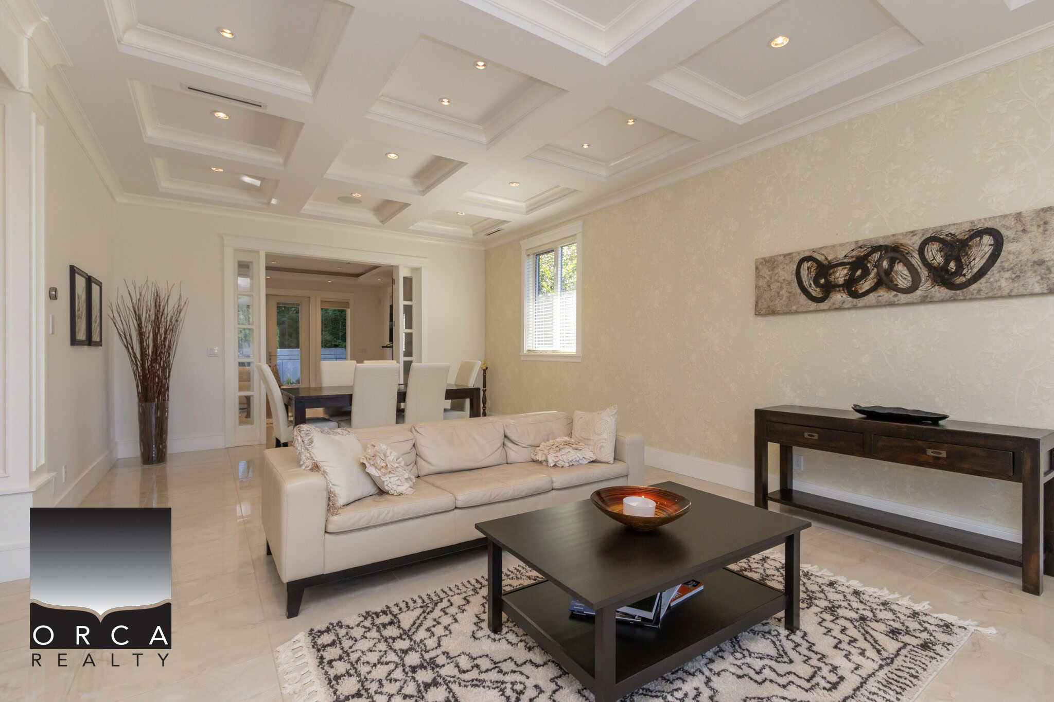 Bright modern living room with elegant décor and contemporary furniture, showcasing a spacious layout ideal for Vancouver real estate. Perfect for those seeking luxurious residential properties in BC.