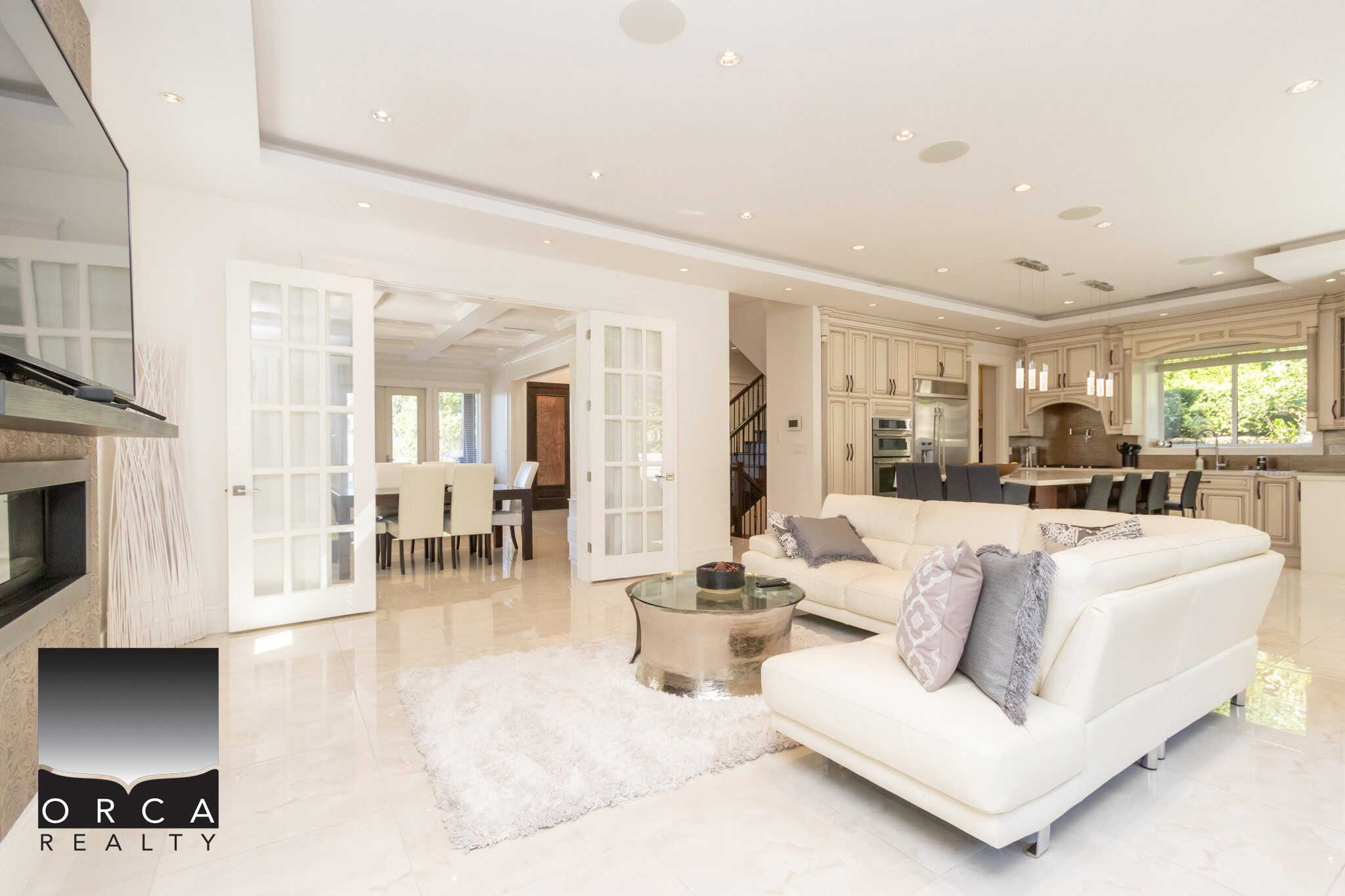 Luxurious open-concept living room in a modern Vancouver-area home, featuring neutral tones, high-end furnishings, and abundant natural light, perfect for upscale real estate listings.