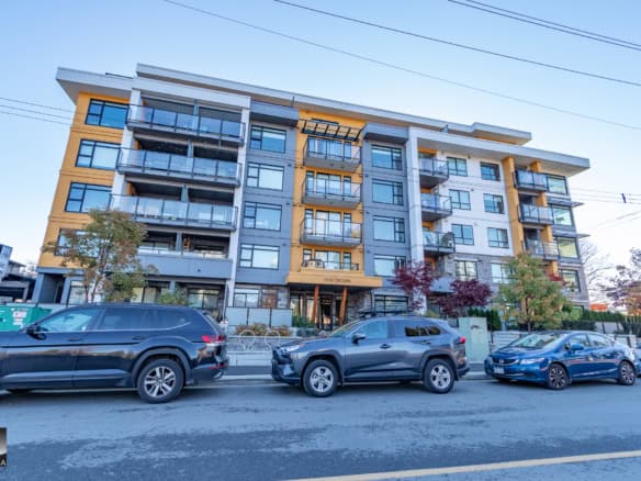 Modern downtown Vancouver apartment building with spacious balconies and stylish design - Orca Realty Inc.